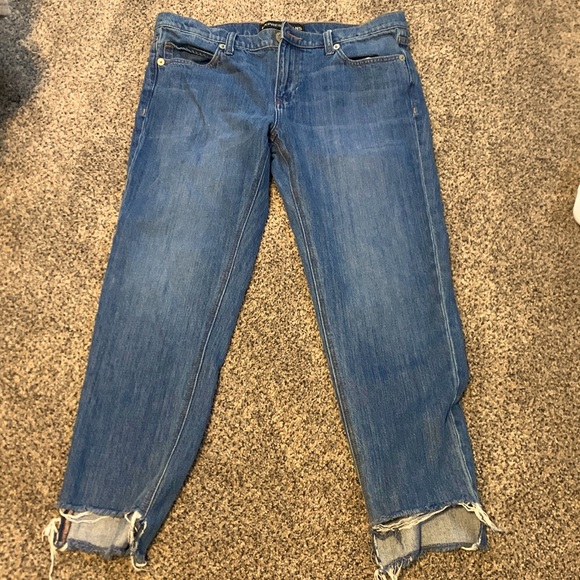 Express Denim - Size 8 express girlfriend ankle blue jean. Fray/ripped detail at ankle. Cropped.